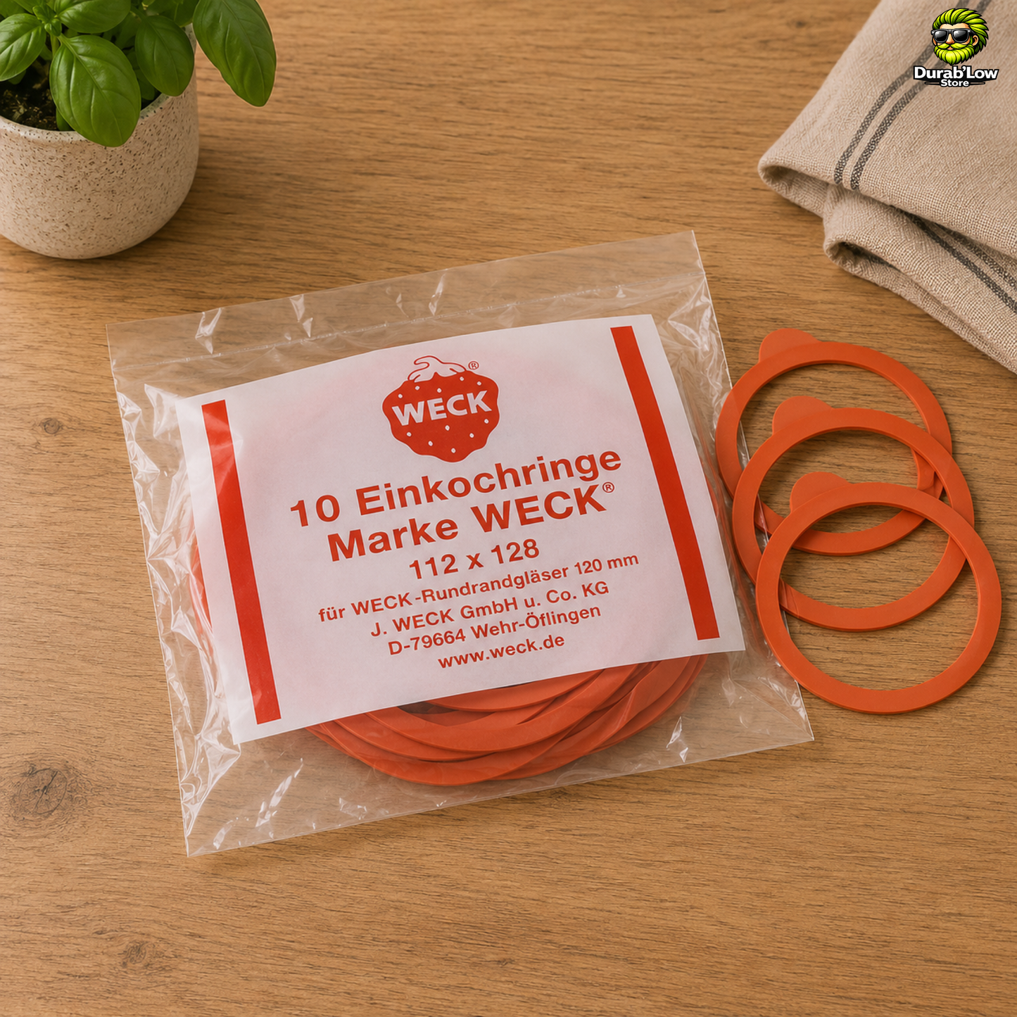 Sachet de 10 joints Weck diamètre 120mm sur un plan de travail de cuisine.