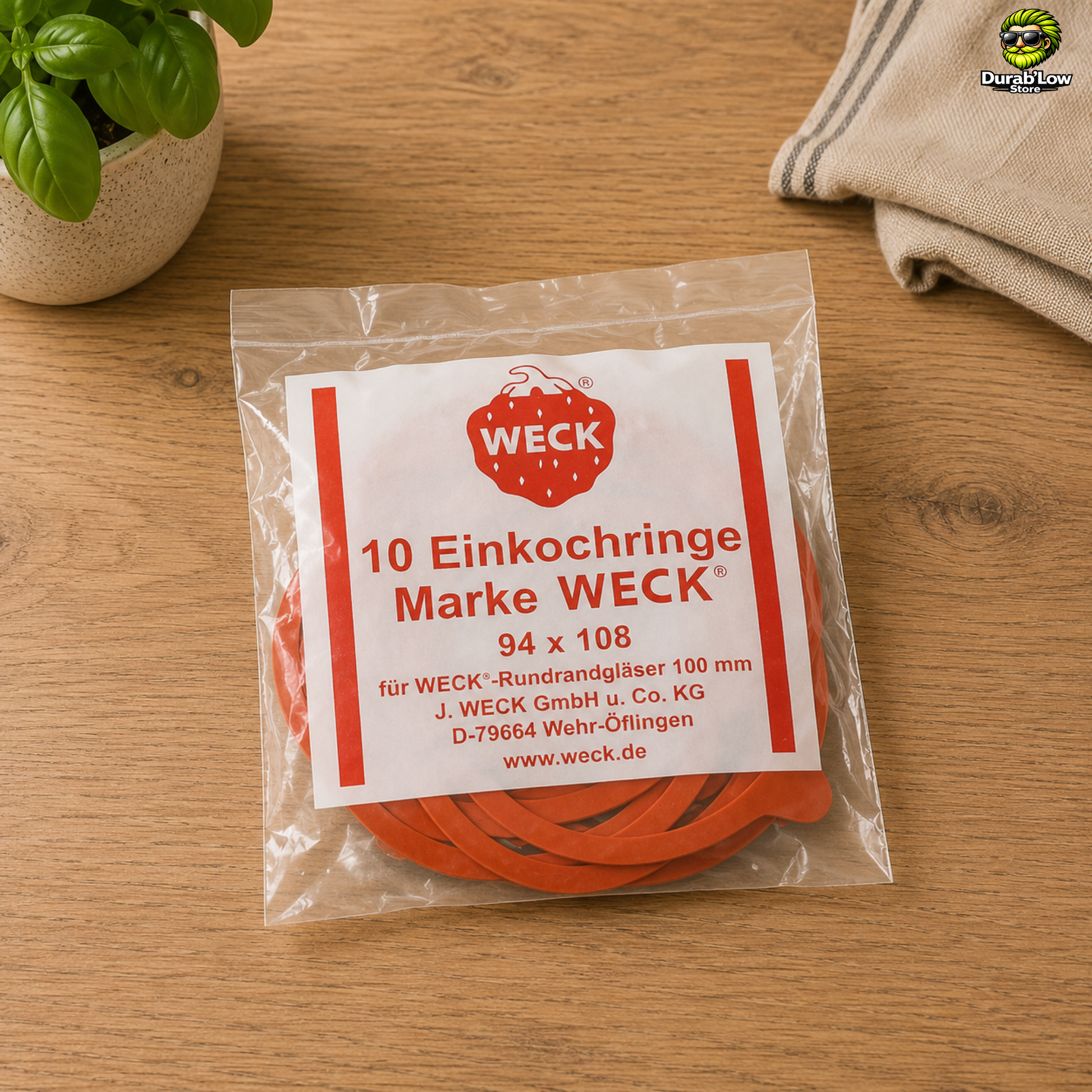 Sachet de 10 joints Weck diamètre 100mm sur un plan de travail de cuisine.